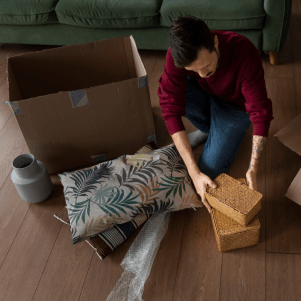 man-packing-home-items-for-house-clearance